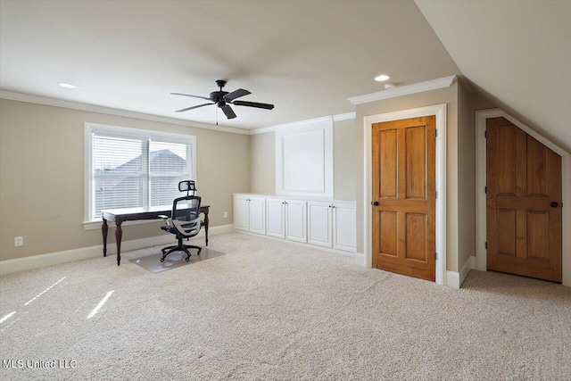 carpeted office featuring crown molding and ceiling fan