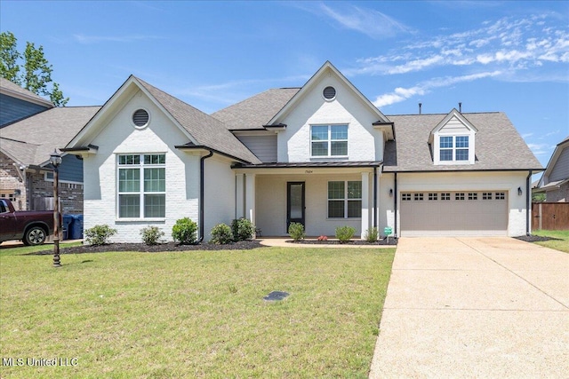 13604 Live Oak Loop, Olive Branch, MS 38654 - view of front facade with driveway, a shingled roof, brick siding, and a garage