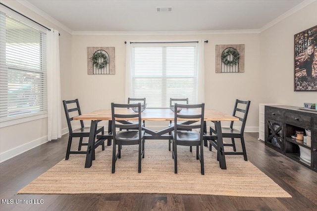 13604 Live Oak Loop, Olive Branch, MS 38654 - dining area with crown molding, baseboards, and dark wood-style flooring