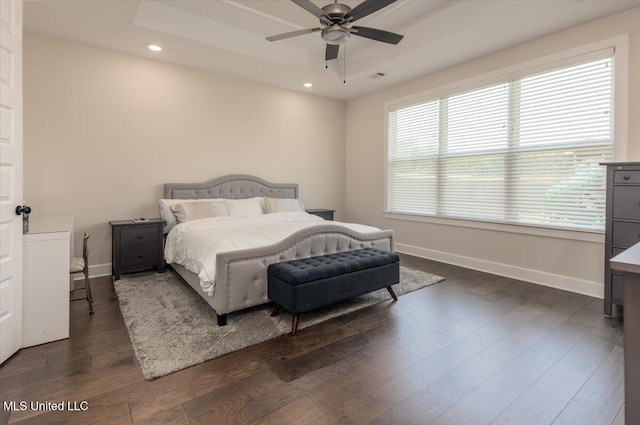 13604 Live Oak Loop, Olive Branch, MS 38654 - bedroom featuring dark wood-style flooring, baseboards, recessed lighting, a raised ceiling, and ceiling fan
