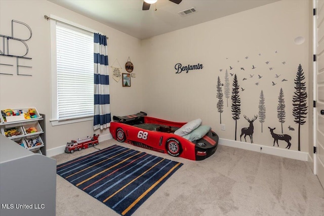 13604 Live Oak Loop, Olive Branch, MS 38654 - bedroom featuring carpet floors, multiple windows, baseboards, and ceiling fan