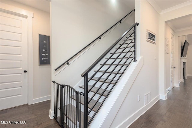 13604 Live Oak Loop, Olive Branch, MS 38654 - staircase with ornamental molding, wood finished floors, and baseboards