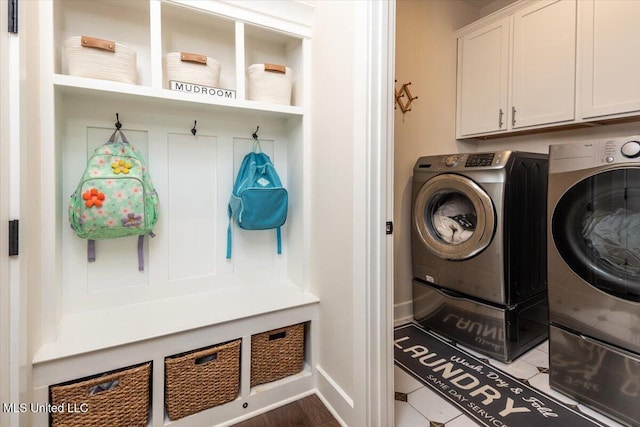 13604 Live Oak Loop, Olive Branch, MS 38654 - clothes washing area with separate washer and dryer, cabinet space, and baseboards