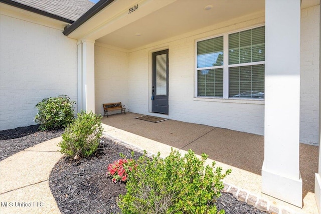 13604 Live Oak Loop, Olive Branch, MS 38654 - view of exterior entry with brick siding