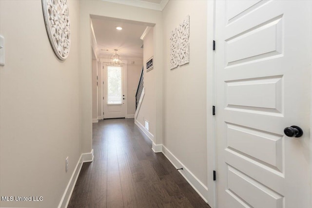 13604 Live Oak Loop, Olive Branch, MS 38654 - corridor with dark wood-type flooring, baseboards, a chandelier, crown molding, and recessed lighting