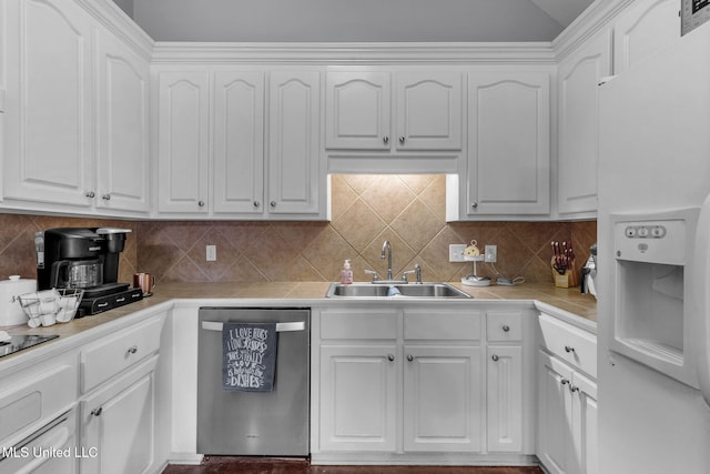 115 Deer Creek Cv, Madison, MS 39110 - kitchen with stainless steel dishwasher, white fridge with ice dispenser, a sink, and white cabinets