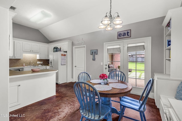 115 Deer Creek Cv, Madison, MS 39110 - dining space with lofted ceiling and a chandelier
