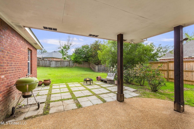 115 Deer Creek Cv, Madison, MS 39110 - view of yard featuring a patio area and an outdoor fire pit
