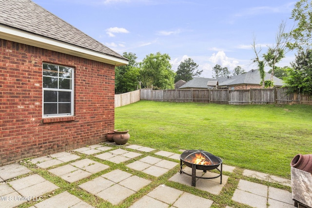 115 Deer Creek Cv, Madison, MS 39110 - view of yard featuring a patio area and a fire pit