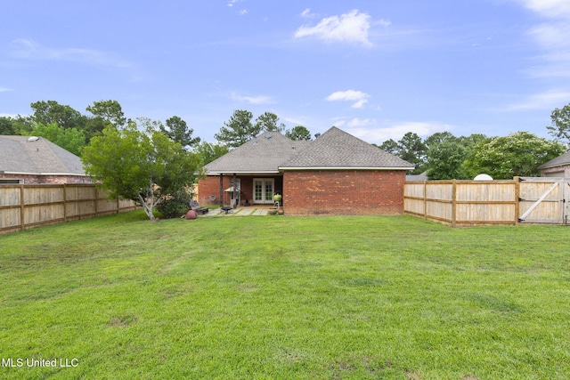 115 Deer Creek Cv, Madison, MS 39110 - back of property with french doors, brick siding, and roof with shingles
