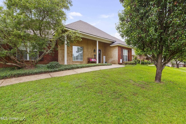 115 Deer Creek Cv, Madison, MS 39110 - single story home featuring a front yard, roof with shingles, and stucco siding