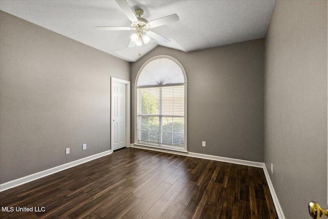 412 Dunlin Ct, Brandon, MS 39047 - spare room with a ceiling fan, dark wood-style floors, baseboards, and lofted ceiling