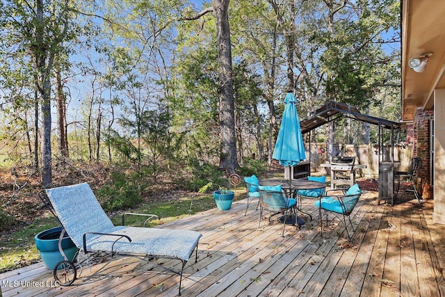 wooden deck with grilling area