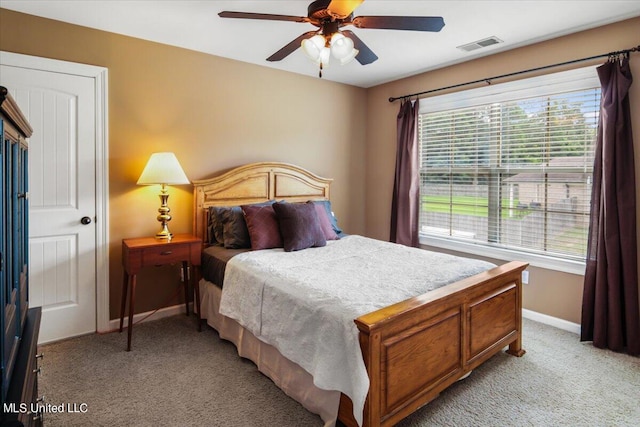 carpeted bedroom featuring ceiling fan