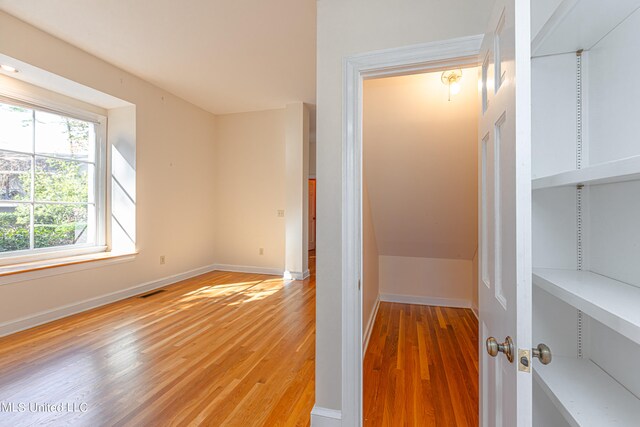 interior space with hardwood / wood-style floors