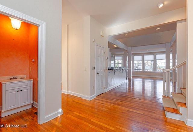 hallway featuring light hardwood / wood-style flooring