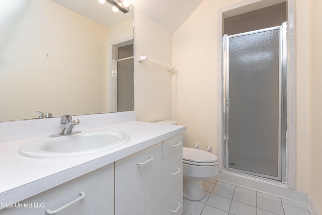 bathroom with lofted ceiling, toilet, a shower with shower door, vanity, and tile patterned flooring