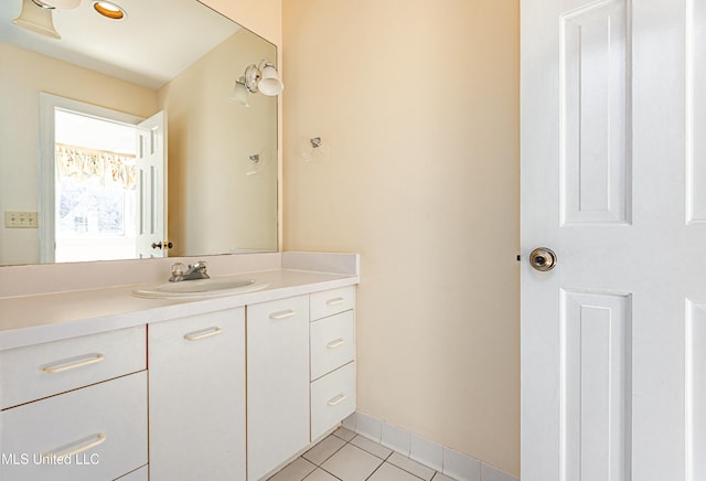 bathroom with vanity and tile patterned flooring