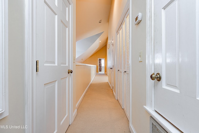 hall with light carpet
