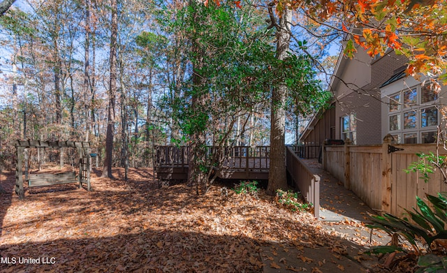 view of yard featuring a deck