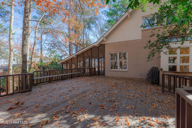 deck with a sunroom