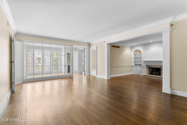 unfurnished living room with crown molding and dark hardwood / wood-style floors