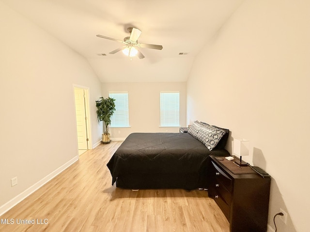 3020 Makenlee St, Southaven, MS 38672 - bedroom featuring light wood-style flooring, baseboards, vaulted ceiling, and ceiling fan