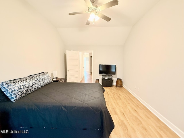 3020 Makenlee St, Southaven, MS 38672 - bedroom with lofted ceiling, wood finished floors, baseboards, and a ceiling fan