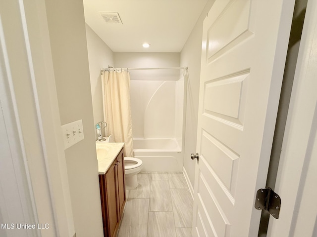 3020 Makenlee St, Southaven, MS 38672 - full bathroom featuring toilet, vanity, shower / bathtub combination with curtain, and recessed lighting