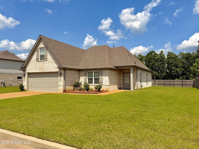 3020 Makenlee St, Southaven, MS 38672 - view of front of property featuring brick siding, driveway, roof with shingles, and an attached garage