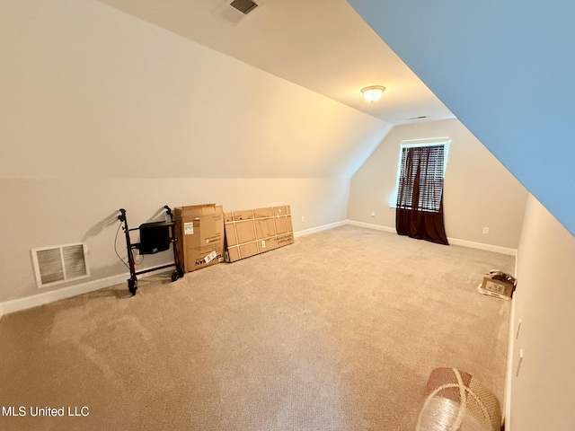 3020 Makenlee St, Southaven, MS 38672 - bonus room featuring lofted ceiling, carpet floors, and baseboards