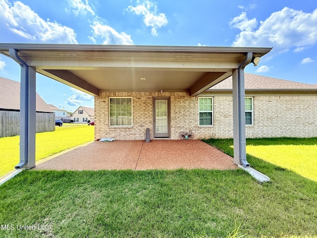 3020 Makenlee St, Southaven, MS 38672 - back of house with a patio area and brick siding