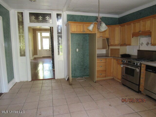 kitchen with ornamental molding, pendant lighting, a notable chandelier, and stainless steel appliances