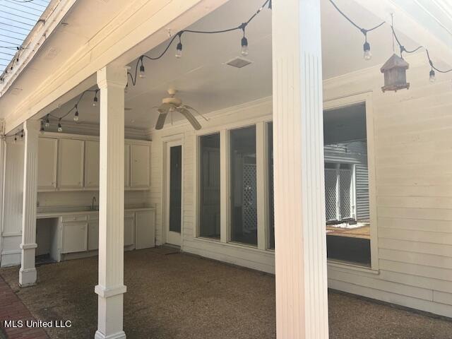 view of patio / terrace with ceiling fan