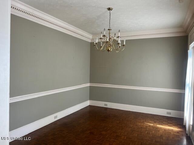 unfurnished room with ornamental molding, a chandelier, dark parquet floors, and a textured ceiling