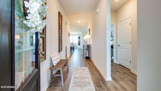 hall featuring hardwood / wood-style floors