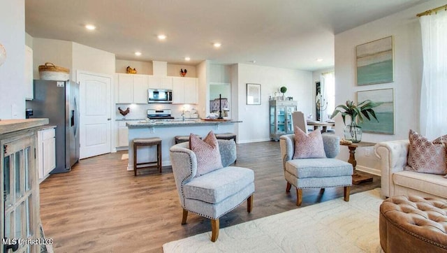 living room featuring light hardwood / wood-style flooring