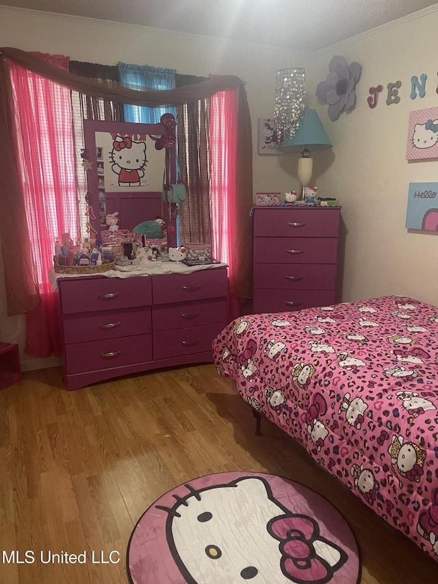bedroom with light wood-style floors