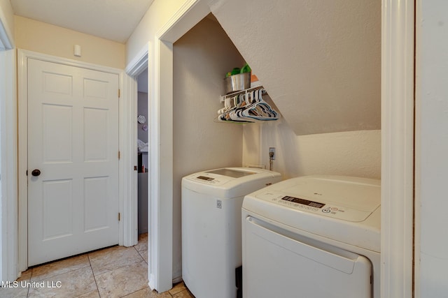 laundry room with separate washer and dryer