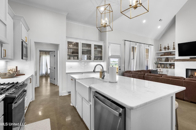 212 Ashbury Cv, Canton, MS 39046 - kitchen featuring appliances with stainless steel finishes, white cabinets, and concrete floors