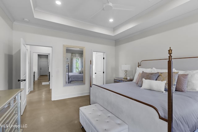212 Ashbury Cv, Canton, MS 39046 - bedroom featuring baseboards, finished concrete flooring, crown molding, and a tray ceiling