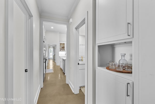 212 Ashbury Cv, Canton, MS 39046 - hallway featuring crown molding, baseboards, light carpet, and recessed lighting