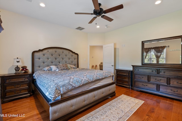 bedroom featuring ceiling fan and wood-type flooring