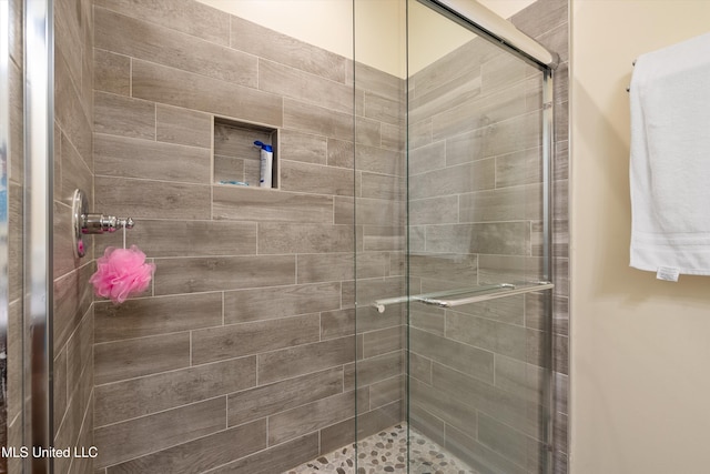 bathroom featuring walk in shower