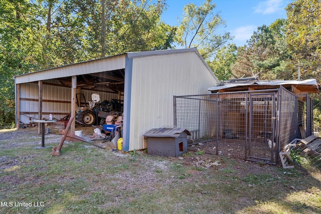 view of outdoor structure with a lawn