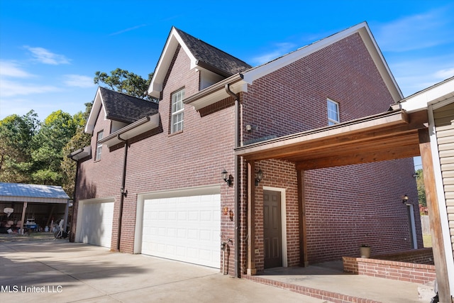 view of home's exterior with a garage