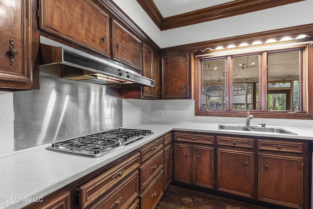 316 Meadow Creek Pl, Jackson, MS 39211 - kitchen featuring a sink, ventilation hood, ornamental molding, stainless steel gas stovetop, and light countertops