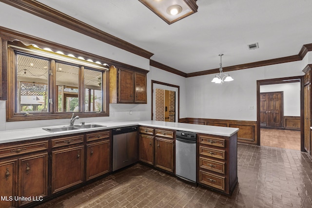 316 Meadow Creek Pl, Jackson, MS 39211 - kitchen featuring stainless steel dishwasher, a sink, brick patterned flooring, a peninsula, and wainscoting