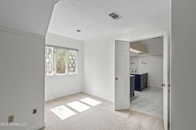 316 Meadow Creek Pl, Jackson, MS 39211 - spare room featuring a sink, baseboards, light marble finish floors, and ornamental molding