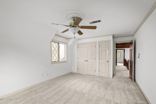 316 Meadow Creek Pl, Jackson, MS 39211 - unfurnished bedroom featuring light colored carpet, multiple windows, ornamental molding, and baseboards